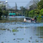 Transportation in flooding. Bangkok, Thailand.