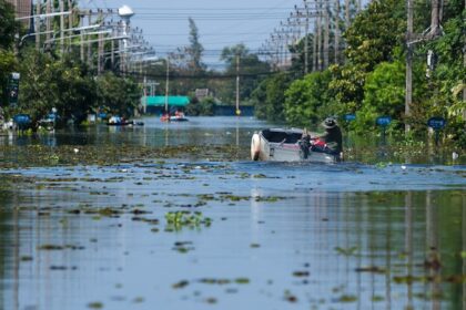 Transportation in flooding. Bangkok, Thailand.